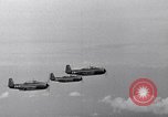 Image of Ships and planes of invasion task force practice maneuvers Pacific Ocean, 1944, second 38 stock footage video 65675040322