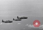 Image of Ships and planes of invasion task force practice maneuvers Pacific Ocean, 1944, second 39 stock footage video 65675040322