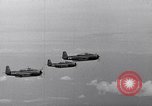 Image of Ships and planes of invasion task force practice maneuvers Pacific Ocean, 1944, second 42 stock footage video 65675040322