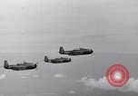Image of Ships and planes of invasion task force practice maneuvers Pacific Ocean, 1944, second 47 stock footage video 65675040322