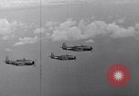 Image of Ships and planes of invasion task force practice maneuvers Pacific Ocean, 1944, second 50 stock footage video 65675040322