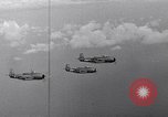 Image of Ships and planes of invasion task force practice maneuvers Pacific Ocean, 1944, second 51 stock footage video 65675040322