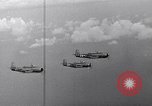 Image of Ships and planes of invasion task force practice maneuvers Pacific Ocean, 1944, second 52 stock footage video 65675040322
