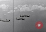 Image of Ships and planes of invasion task force practice maneuvers Pacific Ocean, 1944, second 53 stock footage video 65675040322