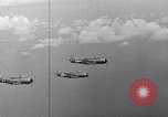 Image of Ships and planes of invasion task force practice maneuvers Pacific Ocean, 1944, second 55 stock footage video 65675040322