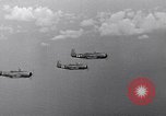 Image of Ships and planes of invasion task force practice maneuvers Pacific Ocean, 1944, second 60 stock footage video 65675040322