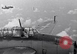 Image of TBF and F4F Wildcat in practice maneuvers with Peleliu Task Force Pacific Ocean, 1944, second 3 stock footage video 65675040323