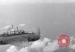 Image of TBF and F4F Wildcat in practice maneuvers with Peleliu Task Force Pacific Ocean, 1944, second 4 stock footage video 65675040323