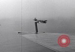 Image of TBF and F4F Wildcat in practice maneuvers with Peleliu Task Force Pacific Ocean, 1944, second 32 stock footage video 65675040323