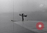 Image of TBF and F4F Wildcat in practice maneuvers with Peleliu Task Force Pacific Ocean, 1944, second 33 stock footage video 65675040323