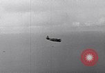 Image of TBF and F4F Wildcat in practice maneuvers with Peleliu Task Force Pacific Ocean, 1944, second 39 stock footage video 65675040323