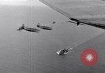 Image of TBF and F4F Wildcat in practice maneuvers with Peleliu Task Force Pacific Ocean, 1944, second 42 stock footage video 65675040323