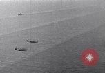 Image of TBF and F4F Wildcat in practice maneuvers with Peleliu Task Force Pacific Ocean, 1944, second 43 stock footage video 65675040323