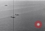 Image of TBF and F4F Wildcat in practice maneuvers with Peleliu Task Force Pacific Ocean, 1944, second 47 stock footage video 65675040323