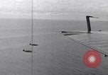Image of TBF and F4F Wildcat in practice maneuvers with Peleliu Task Force Pacific Ocean, 1944, second 50 stock footage video 65675040323
