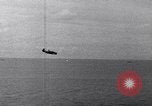 Image of TBF and F4F Wildcat in practice maneuvers with Peleliu Task Force Pacific Ocean, 1944, second 56 stock footage video 65675040323