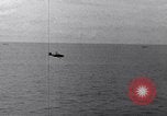 Image of TBF and F4F Wildcat in practice maneuvers with Peleliu Task Force Pacific Ocean, 1944, second 58 stock footage video 65675040323