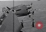 Standbild TBF UND F4F Flugzeug beim Start von USS Marcus Insel (CVE-77) Pazifik, 1944, aus Sekunde 20 historischem Filmmaterial Videoclip 65675040324