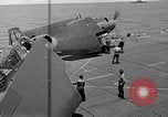 Standbild TBF UND F4F Flugzeug beim Start von USS Marcus Insel (CVE-77) Pazifik, 1944, aus Sekunde 23 historischem Filmmaterial Videoclip 65675040324