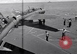 Standbild TBF UND F4F Flugzeug beim Start von USS Marcus Insel (CVE-77) Pazifik, 1944, aus Sekunde 31 historischem Filmmaterial Videoclip 65675040324
