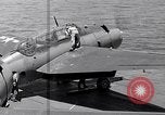 Standbild TBF UND F4F Flugzeug beim Start von USS Marcus Insel (CVE-77) Pazifik, 1944, aus Sekunde 38 historischem Filmmaterial Videoclip 65675040324