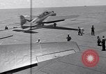 Standbild TBF UND F4F Flugzeug beim Start von USS Marcus Insel (CVE-77) Pazifik, 1944, aus Sekunde 53 historischem Filmmaterial Videoclip 65675040324