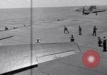 Standbild TBF UND F4F Flugzeug beim Start von USS Marcus Insel (CVE-77) Pazifik, 1944, aus Sekunde 54 historischem Filmmaterial Videoclip 65675040324