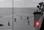 Standbild TBF UND F4F Flugzeug beim Start von USS Marcus Insel (CVE-77) Pazifik, 1944, aus Sekunde 56 historischem Filmmaterial Videoclip 65675040324