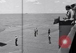 Standbild TBF UND F4F Flugzeug beim Start von USS Marcus Insel (CVE-77) Pazifik, 1944, aus Sekunde 60 historischem Filmmaterial Videoclip 65675040324