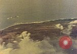 Image of U.S. Navy Grumman TBF avenger aircraft attacking Japanese Iwo Jima, 1945, second 12 stock footage video 65675040325