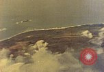 Image of U.S. Navy Grumman TBF avenger aircraft attacking Japanese Iwo Jima, 1945, second 13 stock footage video 65675040325