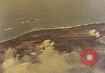 Image of U.S. Navy Grumman TBF avenger aircraft attacking Japanese Iwo Jima, 1945, second 14 stock footage video 65675040325