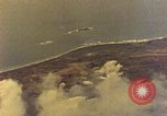 Image of U.S. Navy Grumman TBF avenger aircraft attacking Japanese Iwo Jima, 1945, second 17 stock footage video 65675040325