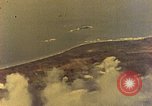 Image of U.S. Navy Grumman TBF avenger aircraft attacking Japanese Iwo Jima, 1945, second 18 stock footage video 65675040325