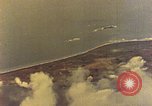 Image of U.S. Navy Grumman TBF avenger aircraft attacking Japanese Iwo Jima, 1945, second 20 stock footage video 65675040325