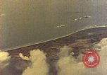 Image of U.S. Navy Grumman TBF avenger aircraft attacking Japanese Iwo Jima, 1945, second 21 stock footage video 65675040325