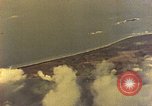 Image of U.S. Navy Grumman TBF avenger aircraft attacking Japanese Iwo Jima, 1945, second 22 stock footage video 65675040325