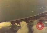 Image of U.S. Navy Grumman TBF avenger aircraft attacking Japanese Iwo Jima, 1945, second 23 stock footage video 65675040325
