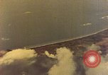 Image of U.S. Navy Grumman TBF avenger aircraft attacking Japanese Iwo Jima, 1945, second 24 stock footage video 65675040325