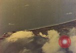 Image of U.S. Navy Grumman TBF avenger aircraft attacking Japanese Iwo Jima, 1945, second 25 stock footage video 65675040325
