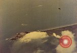 Image of U.S. Navy Grumman TBF avenger aircraft attacking Japanese Iwo Jima, 1945, second 27 stock footage video 65675040325