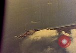 Image of U.S. Navy Grumman TBF avenger aircraft attacking Japanese Iwo Jima, 1945, second 30 stock footage video 65675040325