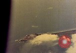 Image of U.S. Navy Grumman TBF avenger aircraft attacking Japanese Iwo Jima, 1945, second 31 stock footage video 65675040325
