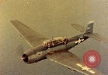 Image of U.S. Navy Grumman TBF avenger aircraft attacking Japanese Iwo Jima, 1945, second 32 stock footage video 65675040325
