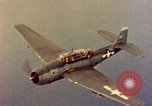 Image of U.S. Navy Grumman TBF avenger aircraft attacking Japanese Iwo Jima, 1945, second 36 stock footage video 65675040325