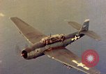 Image of U.S. Navy Grumman TBF avenger aircraft attacking Japanese Iwo Jima, 1945, second 37 stock footage video 65675040325