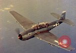 Image of U.S. Navy Grumman TBF avenger aircraft attacking Japanese Iwo Jima, 1945, second 41 stock footage video 65675040325