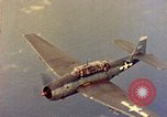 Image of U.S. Navy Grumman TBF avenger aircraft attacking Japanese Iwo Jima, 1945, second 45 stock footage video 65675040325