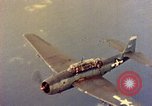 Image of U.S. Navy Grumman TBF avenger aircraft attacking Japanese Iwo Jima, 1945, second 46 stock footage video 65675040325