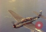Image of U.S. Navy Grumman TBF avenger aircraft attacking Japanese Iwo Jima, 1945, second 47 stock footage video 65675040325